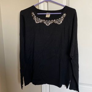 Black sweater with pretty beaded detail at neckline